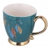 Exotic jumbo cup on foot with gold handle NBC 400 ml dec. Feathers blue Exotic jumbo cup on foot with gold handle NBC 400 ml dec. Feathers blue