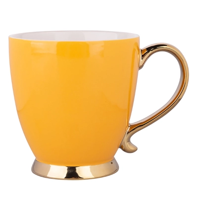 
                                                Exotic jumbo cup on foot with gold handle NBC 400 ml yellow BZ
                                                