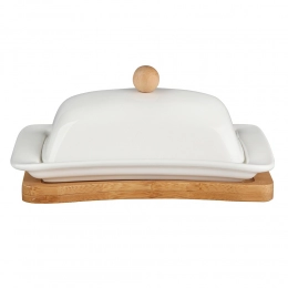 Regular porcelain butter dish on a bamboo base