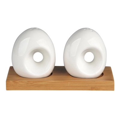 
                                            Salt and pepper dish on bamboo tray
                                            