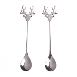 Set of 2 decorative spoons in a color box, dec. silver reindeer