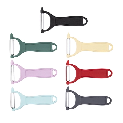 
                                                Oblong  vegetable peeler with curvy blade 4,5 cm
                                                