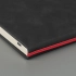 Undated green Muse diary, A5, with a decorative stripe, brown color, cream block.