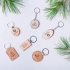 Keychain "PELTON", round, natural beech.