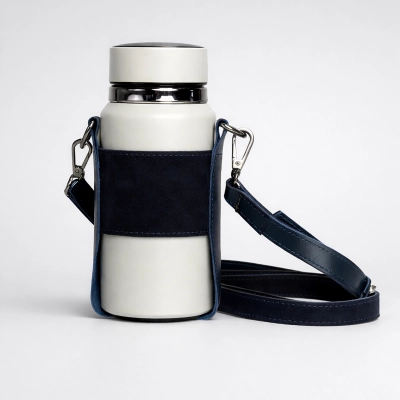 
                                                Thermos with genuine leather case
                                                
