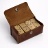 Wooden dominoes in a leather case