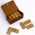 Wooden dominoes in a leather case