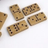 Wooden dominoes in a leather case