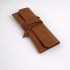 Check presenter made of genuine leather