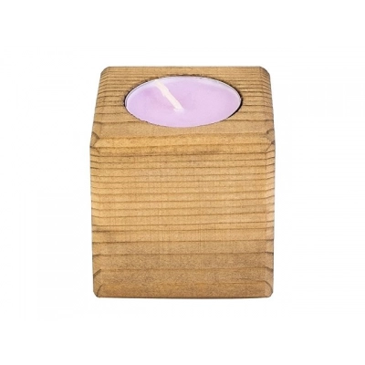 
                                            Candle in a decorative candlestick 