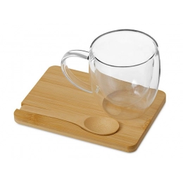 Double-walled mug on a stand with a spoon 