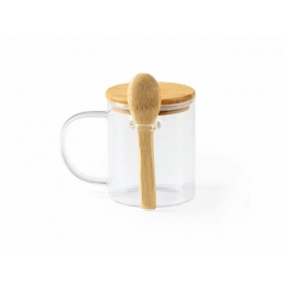 COCO mug with a bamboo lid and spoon.