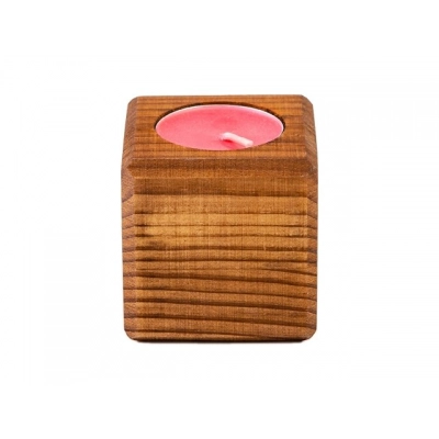 
                                            Candle in a decorative candlestick 