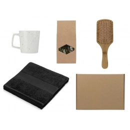 Bath gift set with a towel, comb, and mug.