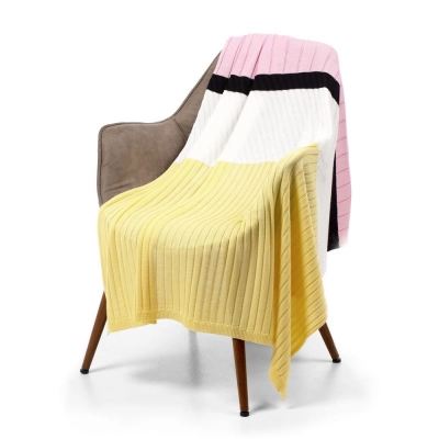 
                                                Friolenta blanket, yellow with pink.
                                                