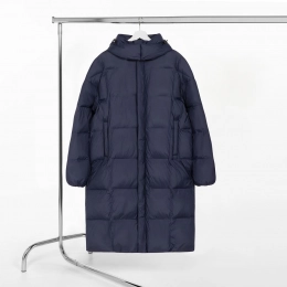 Unisex dark blue Kapsula puffer jacket.