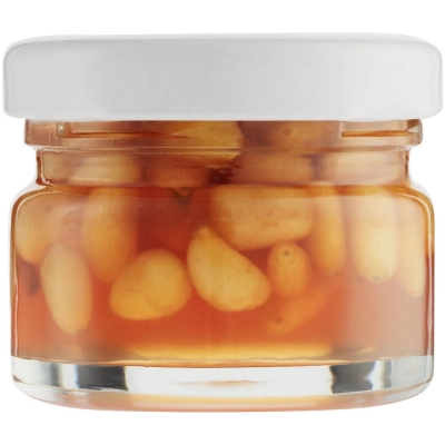 
                                                Cedar nuts Nutree in pine syrup.
                                                