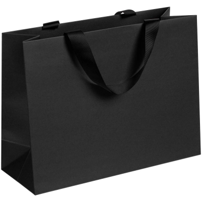 
                                                Manilla M black paper bag.
                                                