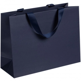 Manilla M blue paper bag.