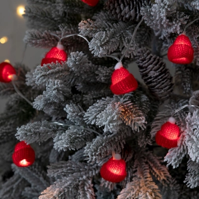 
                                                Red Cosy Poms garland.
                                                