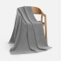 Voyage blanket in a case, grey.