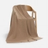 Voyage blanket in a beige case.