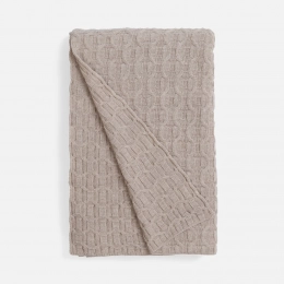 Braidera beige melange blanket.