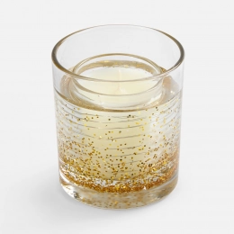 Luminati scented candle with shea butter and vanilla oil.