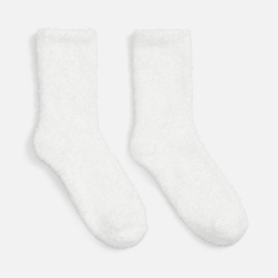 
                                                Flaum white socks.
                                                