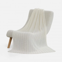 Eloisa milk-colored blanket.