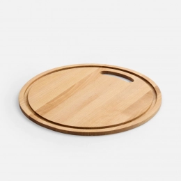 Koivu cutting board with groove.