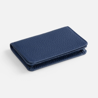 
                                                Blue Unison business card holder.
                                                