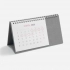 Brand gray desktop calendar.