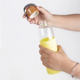 560 ml Vim Booster glass bottle, yellow